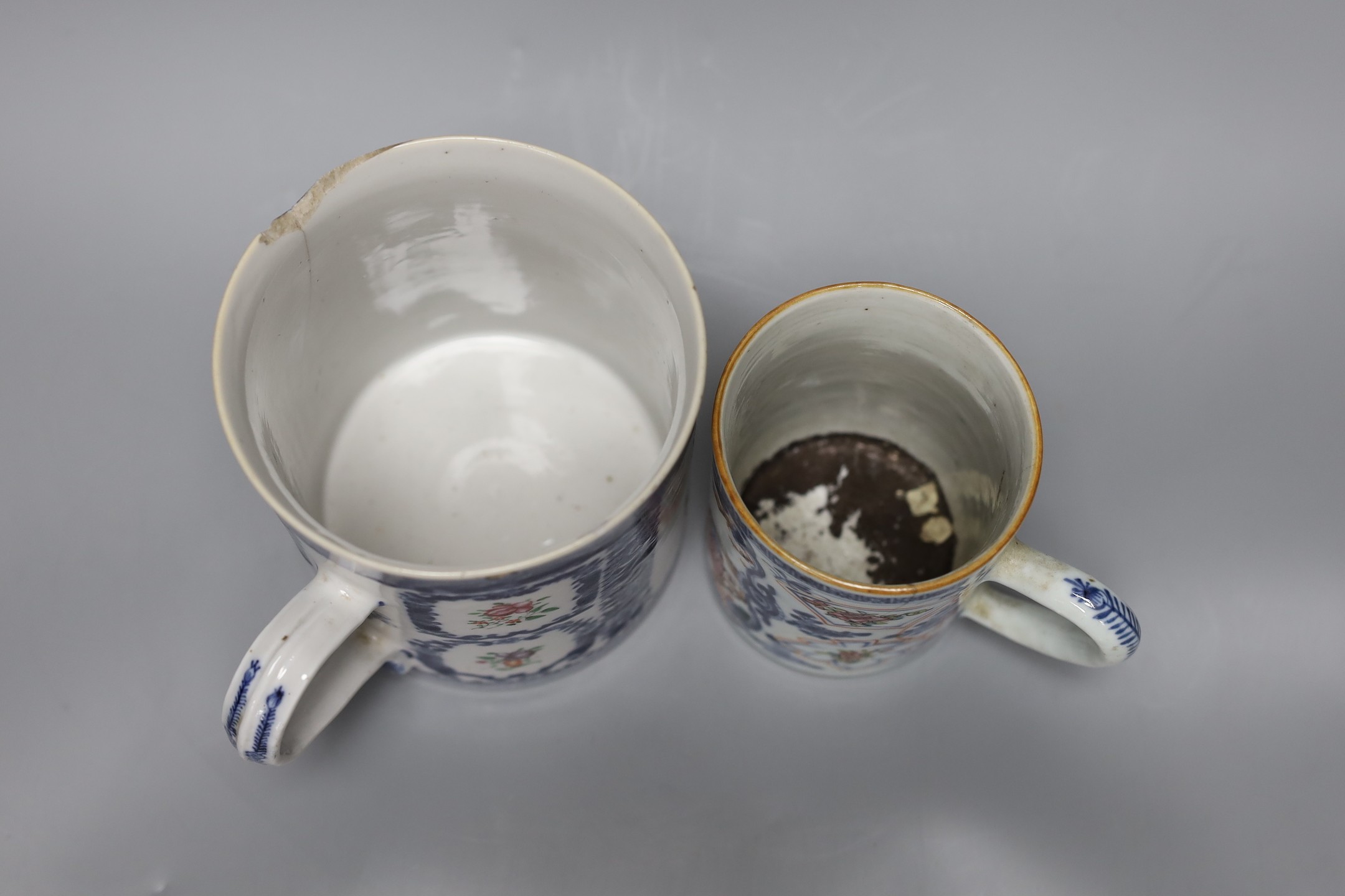 Two 18th century Chinese export tankards, tallest 14cm